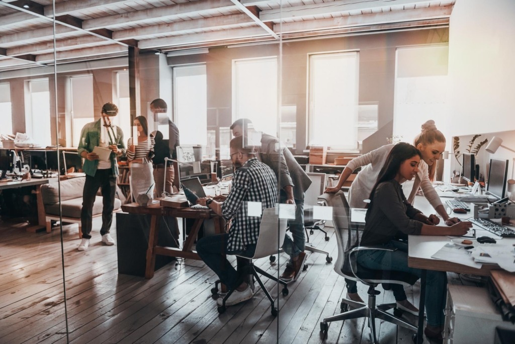 Office setting with people at desks