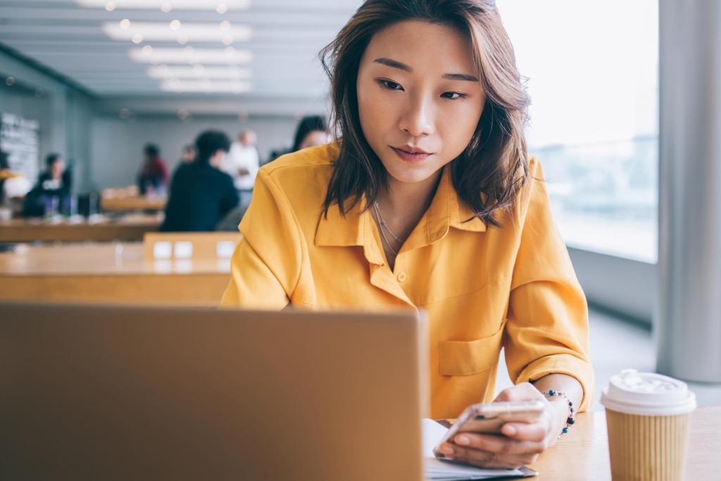 Woman reading with office background